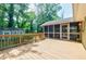 Spacious deck and screened porch, with shed and swing set in the back at 2985 Westbury Dr, Decatur, GA 30033
