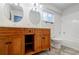 Well-lit bathroom with a double vanity, white tiled shower, and classic fixtures for a fresh, clean look at 2985 Westbury Dr, Decatur, GA 30033