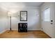 Bright entryway featuring hardwood floors, modern decor, and a stylish front door at 2985 Westbury Dr, Decatur, GA 30033