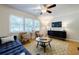 Cozy living room with bright windows, hardwood floors, and comfortable seating arrangement at 2985 Westbury Dr, Decatur, GA 30033