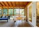 Comfortable screened porch with a seating area and dining set perfect for outdoor relaxation at 2985 Westbury Dr, Decatur, GA 30033