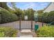 The community features a pet-friendly area with secure fencing and waste disposal amenities at 136 Peachtree Memorial Nw Dr # Nh4, Atlanta, GA 30309