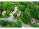 Neighborhood aerial shot revealing homes with lush, green surroundings and landscaped lawns at 1694 Peachcrest Ct, Lawrenceville, GA 30043