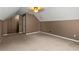 Spacious bedroom featuring neutral walls and plush patterned carpeting at 1694 Peachcrest Ct, Lawrenceville, GA 30043
