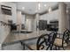 Kitchen with granite countertops, stainless steel appliances and breakfast bar with seating at 1694 Peachcrest Ct, Lawrenceville, GA 30043