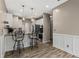 Kitchen with granite countertops, modern appliances and breakfast bar with seating at 1694 Peachcrest Ct, Lawrenceville, GA 30043