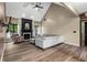 Spacious living room features a cozy fireplace and ample seating for relaxing at 1694 Peachcrest Ct, Lawrenceville, GA 30043