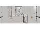 Luxurious bathroom featuring a standalone tub and elegant tile flooring at 4814 Sultana Sw Way, Atlanta, GA 30331