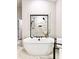 Beautiful bathroom with a soaking tub and a tiled shower at 4814 Sultana Sw Way, Atlanta, GA 30331