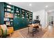 Cozy home office with built-in bookshelves and a comfortable workspace at 4814 Sultana Sw Way, Atlanta, GA 30331