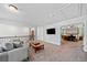 Cozy loft area with comfortable seating, tv, and a view into the nearby bedroom at 4814 Sultana Sw Way, Atlanta, GA 30331