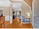 Inviting entryway with hardwood floors, white trim, and views of the living area at 4845 Backbay St, Suwanee, GA 30024