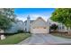 Charming home with a two-car garage, driveway, and well-manicured lawn at 4845 Backbay St, Suwanee, GA 30024