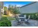 Outdoor patio featuring a table and chairs, perfect for outdoor dining and entertaining at 4845 Backbay St, Suwanee, GA 30024