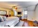 Bright bedroom features sloped ceilings, hardwood floors, and a window seat at 965 Sundew Se Dr, Conyers, GA 30013