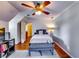 Bedroom with hardwood floors, ceiling fan, and neutral color palette at 965 Sundew Se Dr, Conyers, GA 30013