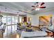 Bright and airy living room with large windows, hardwood floors, and comfortable seating at 965 Sundew Se Dr, Conyers, GA 30013