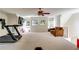 Spacious living room with carpet, ceiling fan and windows overlooking the yard at 965 Sundew Se Dr, Conyers, GA 30013
