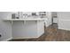 Bright eat-in kitchen area with white cabinets and modern appliances at 2482 Windchase Ct, Buford, GA 30518