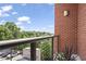 Balcony view showcasing city skyline and lush greenery on a clear day at 326 Roswell Se St # 508, Marietta, GA 30060