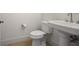 Powder room featuring pedestal sink and toilet with tile flooring at 326 Roswell Se St # 508, Marietta, GA 30060