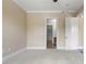 Spacious carpeted bedroom with neutral walls and a walk-in closet at 326 Roswell Se St # 508, Marietta, GA 30060