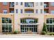 Attractive building entrance featuring large windows and professional signage, situated along a landscaped city street at 326 Roswell Se St # 508, Marietta, GA 30060