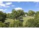 Sweeping view of a meticulously maintained cemetery with rows of white headstones and mature trees at 326 Roswell Se St # 508, Marietta, GA 30060