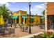 Charming yellow building with outdoor seating, ideal for relaxing and enjoying the vibrant atmosphere at 326 Roswell Se St # 508, Marietta, GA 30060