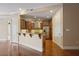Well-appointed kitchen with wooden cabinets, granite countertops, stainless steel appliances, and bar seating at 326 Roswell Se St # 508, Marietta, GA 30060
