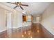 Expansive living room with hardwood floors, neutral walls, recessed lighting, and open kitchen access at 326 Roswell Se St # 508, Marietta, GA 30060