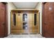 Relaxing wooden sauna room with glass door and women's restroom sign nearby at 326 Roswell Se St # 508, Marietta, GA 30060