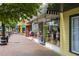 Vibrant shopping district with boutique storefronts, sidewalk displays, and pedestrian-friendly walkways at 326 Roswell Se St # 508, Marietta, GA 30060
