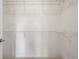 Large walk-in closet with white wire shelving and neutral carpet at 326 Roswell Se St # 508, Marietta, GA 30060