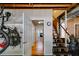 The entrance of the basement showcases new stairs, an adjacent storage room, and access to the main house at 9041 Par Dr, Douglasville, GA 30134