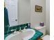 Bathroom featuring tile accents and a classic sink design at 9041 Par Dr, Douglasville, GA 30134
