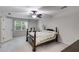 Comfortable bedroom with natural light and neutral decor at 9041 Par Dr, Douglasville, GA 30134