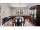 Traditional dining room with hardwood floors and classic furniture at 9041 Par Dr, Douglasville, GA 30134