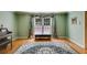 Inviting living room with hardwood flooring and large window views at 9041 Par Dr, Douglasville, GA 30134