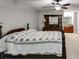 Spacious main bedroom featuring a full bed and dresser at 9041 Par Dr, Douglasville, GA 30134
