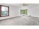 Bedroom with a bay window overlooking a wooded area at 1909 Winding Creek Sw Ln, Marietta, GA 30064