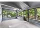 Spacious screened porch offering views of the surrounding greenery at 1909 Winding Creek Sw Ln, Marietta, GA 30064