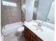 Bright bathroom featuring tiled tub/shower combo and modern vanity at 625 Chestnut St # D, Atlanta, GA 30354