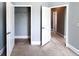 Bedroom featuring carpet flooring, neutral wall paint, and an open closet at 625 Chestnut St # D, Atlanta, GA 30354