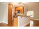 Open concept kitchen with granite countertops, stainless steel appliances, and a breakfast bar at 625 Chestnut St # D, Atlanta, GA 30354