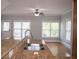 Bright kitchen area with a stainless steel faucet, sink, and view into the living space at 625 Chestnut St # D, Atlanta, GA 30354