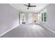 Bright bedroom with neutral carpet, a ceiling fan, and natural light from a window at 848 Fox Nw St, Atlanta, GA 30318
