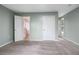 Comfortable bedroom featuring neutral carpet, closet and ensuite access and a neutral aesthetic at 848 Fox Nw St, Atlanta, GA 30318