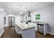 Modern kitchen with stainless steel appliances, granite countertops, and a spacious island at 848 Fox Nw St, Atlanta, GA 30318