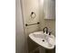 Bathroom with a pedestal sink, stylish black fixtures, and ample lighting at 4701 Flat Shoals Rd # 41-F, Union City, GA 30291